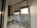 Рулонные шторы на балконе: как сделать из небольшого помещения уютное продолжение дома